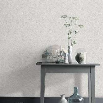 Non-woven tapet i greige med en fin vævet struktur, subtilt moderne og tidløst elegant Non-woven tapet i greige med en fin vævet struktur, subtilt moderne og tidløst elegant