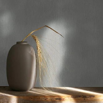 Non-woven tapet i textilutseende med strukturerad yta grå slät 