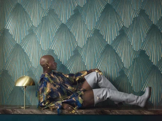 Carta da parati in tessuto non tessuto aspetto 3D, grafica a righe geometrica in verde  