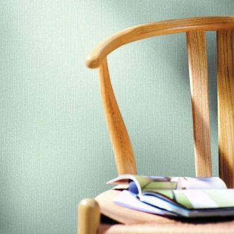 Vliestapete mit feinen Linien und leichter Struktur grün Uni 