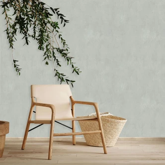 Non-woven wallpaper in gray concrete look used look plain  