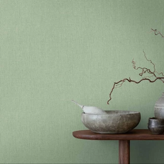 Tapeta flizelinowa w kolorze delikatnej miętowej zieleni z lnianą fakturą - świeży wzór na ścianę do kuchni 