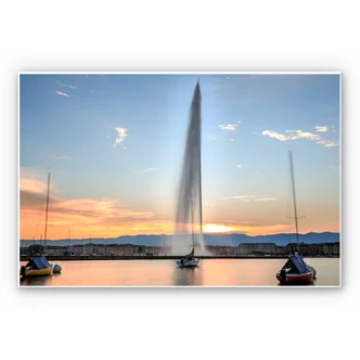 Wandbild Wasserfontäne im Genfer Sonnenuntergang 