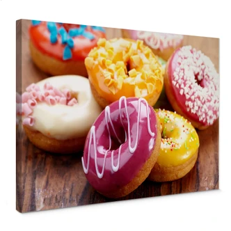 Leinwandbild Zuckersüße Donuts 