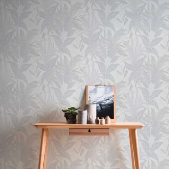 Papier peint avec un délicat motif de feuilles en gris et blanc - papier peint d'inspiration naturelle 