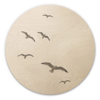 Tableau sur bois rond Mouettes dans le ciel 
