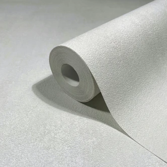 Non-woven wallpaper in gray concrete look used look plain  