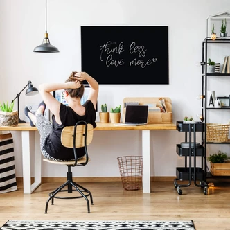 Leinwandbild Think less love more - schwarz-weiß 