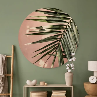 Tableau sur bois rond Feuille de palmier sur mur rose - Böhmer 
