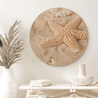 Tableau sur bois rond Poisson-étoile dans la plage dorée 