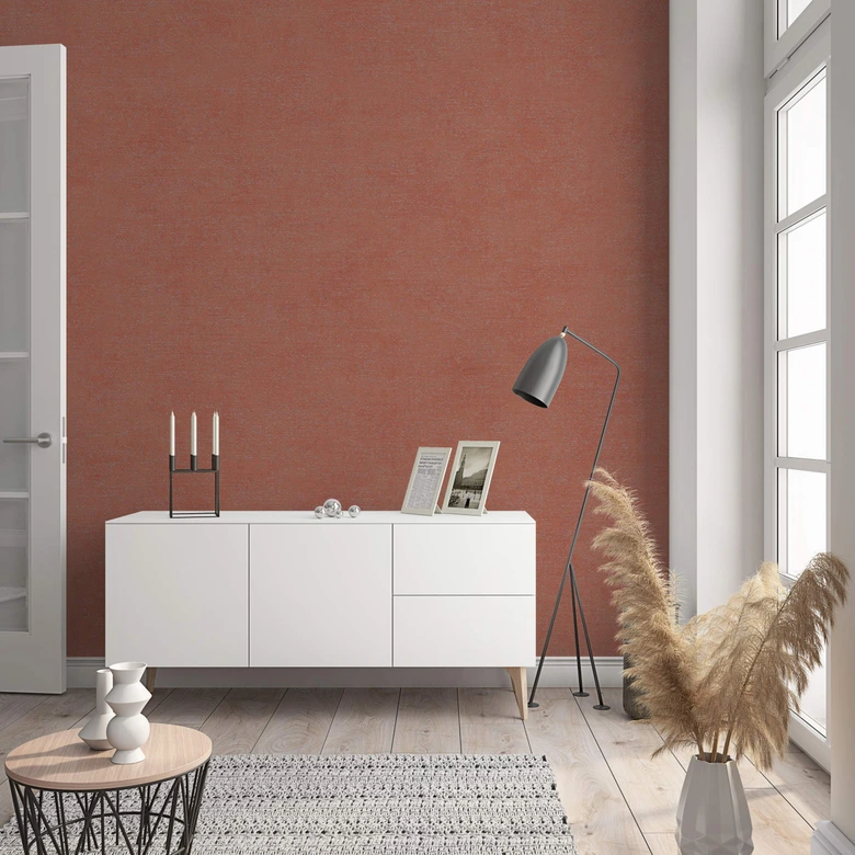 Papier peint intissé d'aspect et de texture modernes en rouge, orange uni 