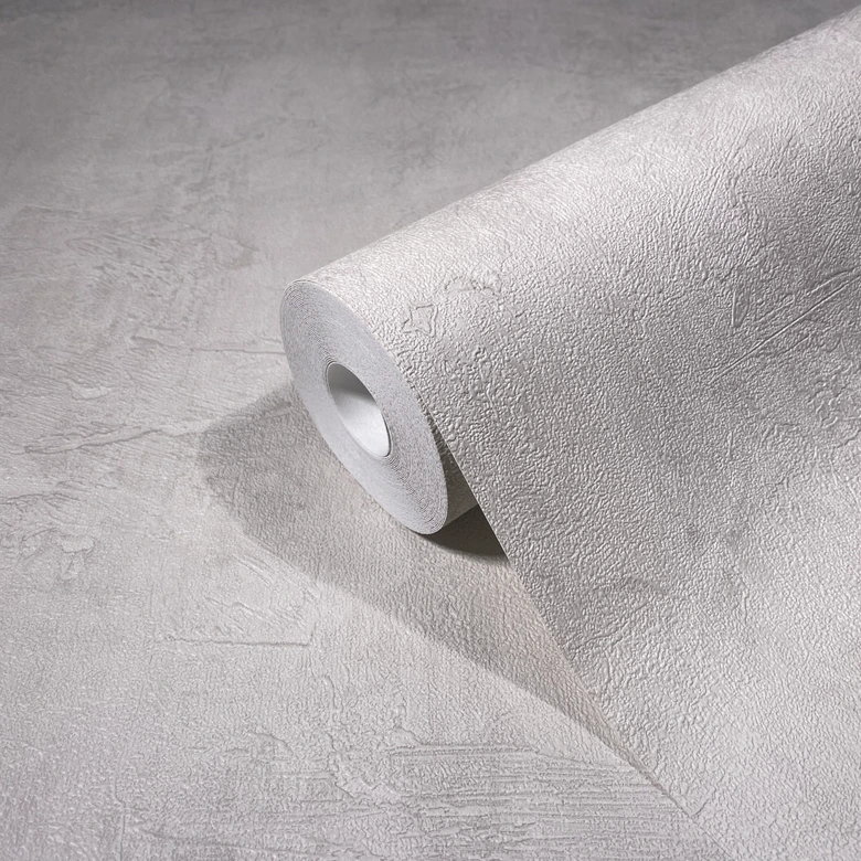 Vliesbehang in betonlook effen beige structuur  