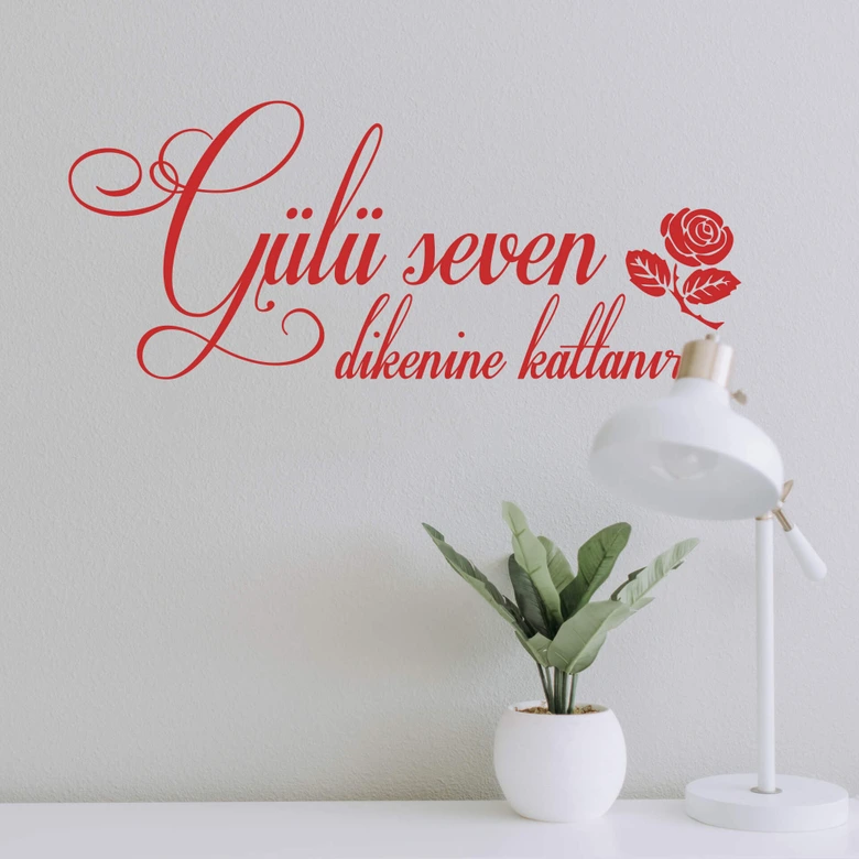 Muursticker Gülü seven dikenine katlanir 
