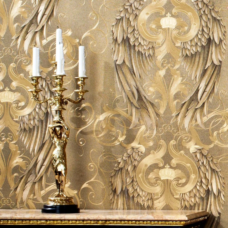 Papier peint intissé avec ailes brillantes or ornemental de Harald Glööckler 