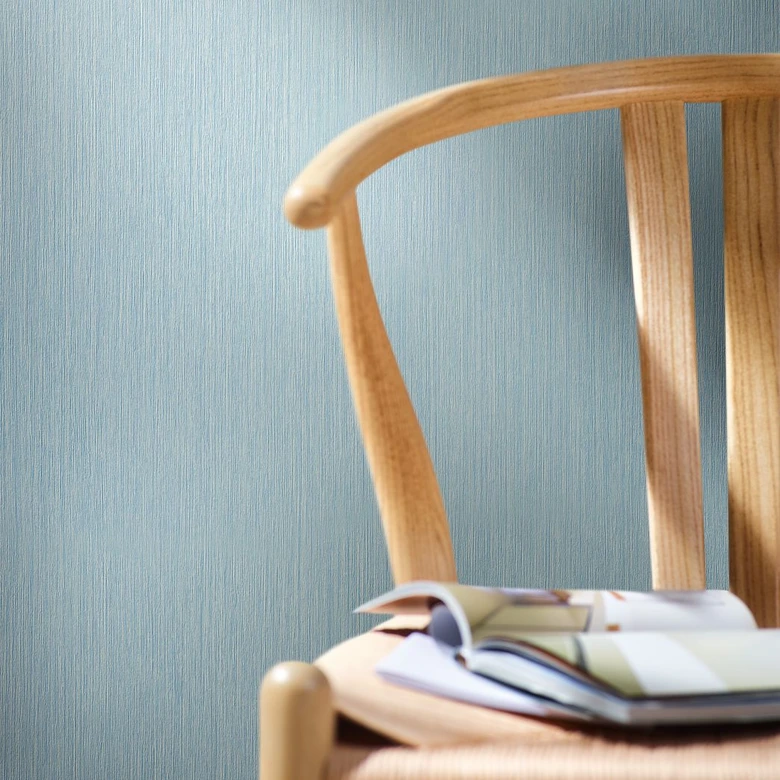 Vliestapete mit feinen Linien und leichter Struktur blau Uni 