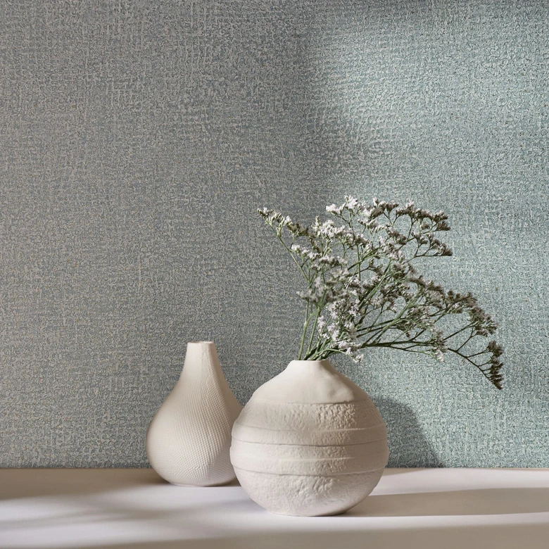 Non-woven tapet i blå texturerad textil gips ser vanligt ut 