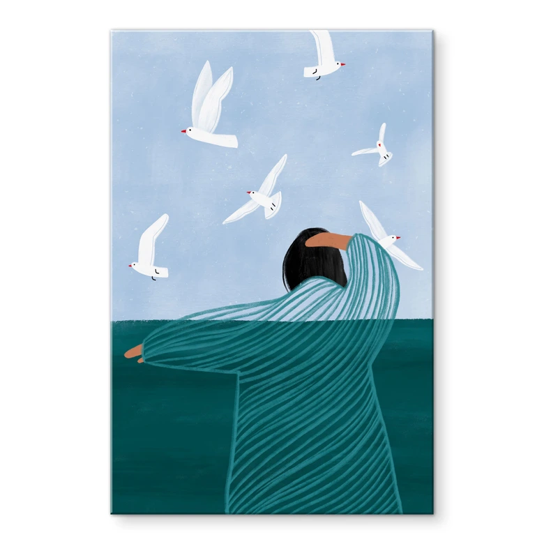 Tableau en verre acrylique Femme avec mouettes au bord de la mer - Müller 