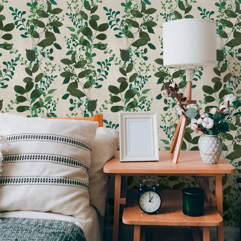 Non-woven wallpaper with a green leaf pattern on a white background 