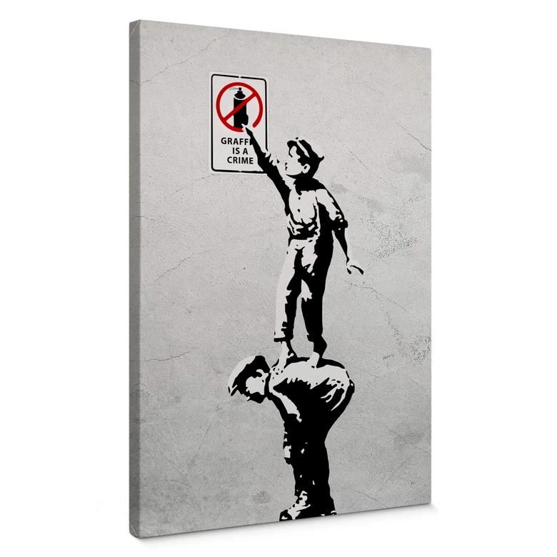 Leinwandbild Banksy - Graffiti is a crime 