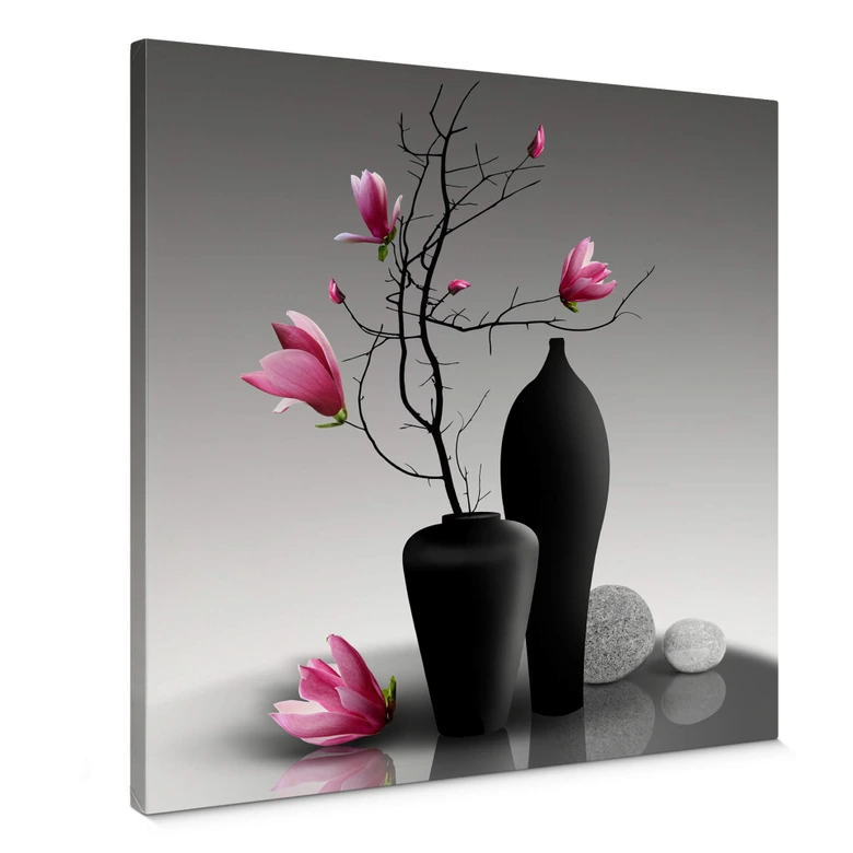 Tableau sur toile Branche de magnolia dans un vase noir 