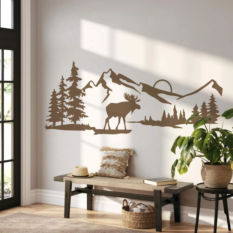 Wallsticker Elg ved solnedgang i et bjerglandskab 
