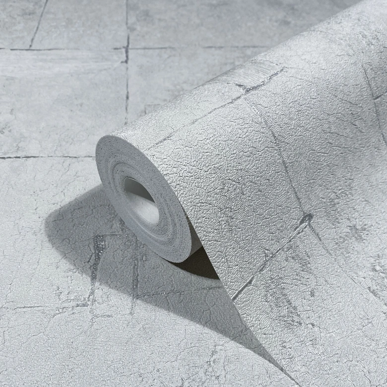Papel pintado no tejido con aspecto de escayola en gráfico gris teja 