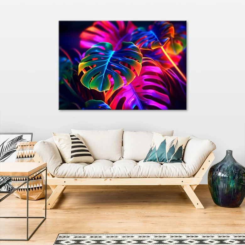 Leinwandbild, Monstera-Blätter in fluoreszierenden Farben 