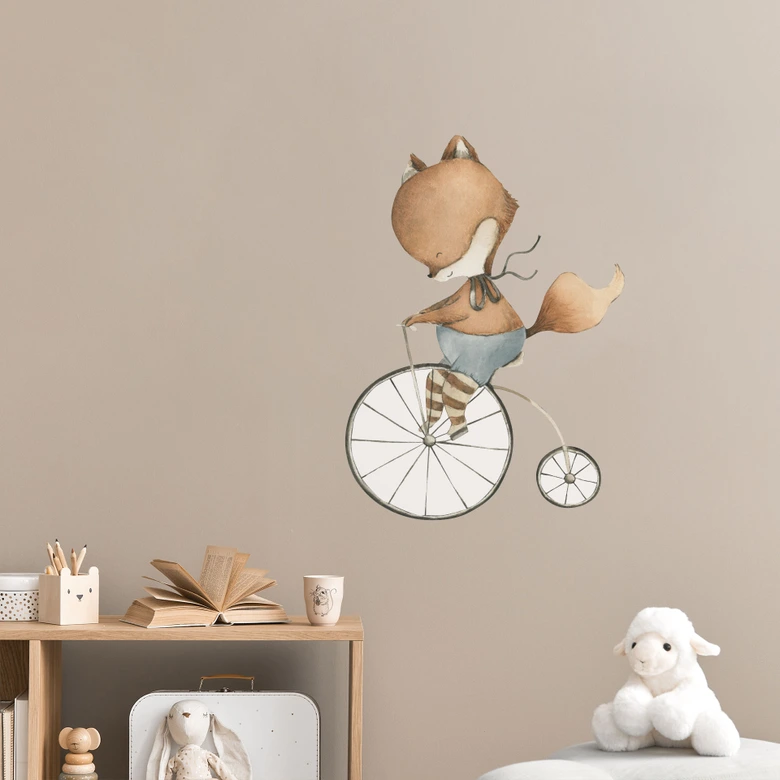 Adesivo murale con volpe su monociclo 