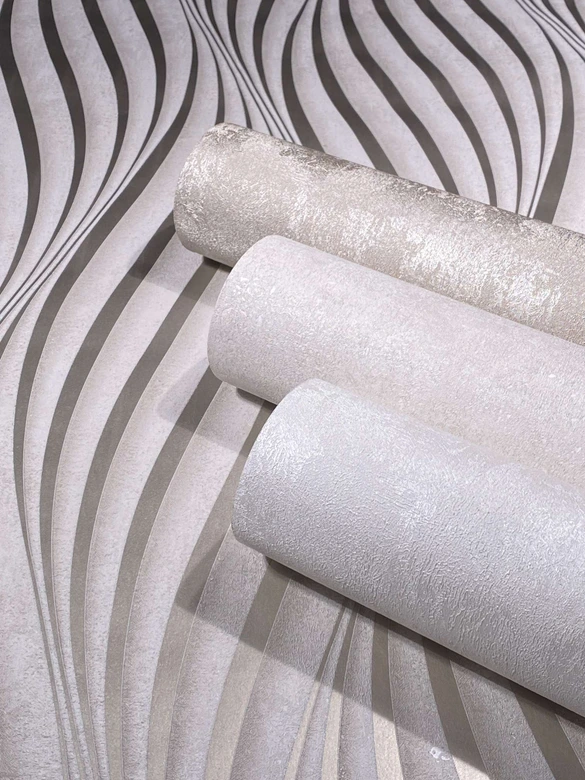 Non-woven tapet med böjda glänsande ränder beige prov 