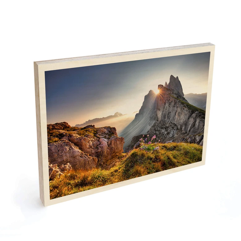 Holzbild Sonnenaufgang über den Bergen in Südtirol 