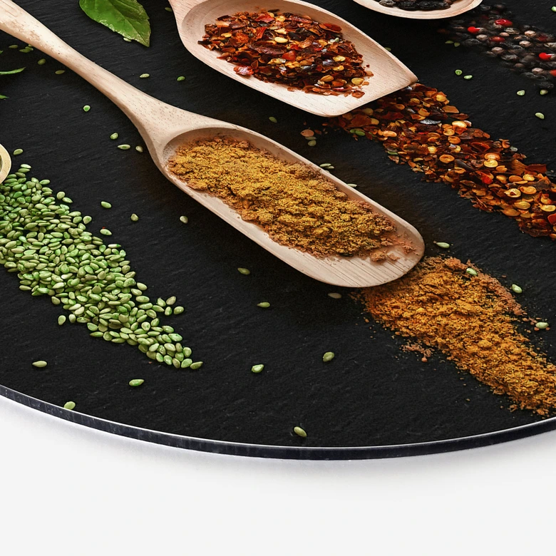 Tableau sur alu-Dibond rond Herbes et épices sur une cuillère en bois - Dingemans 