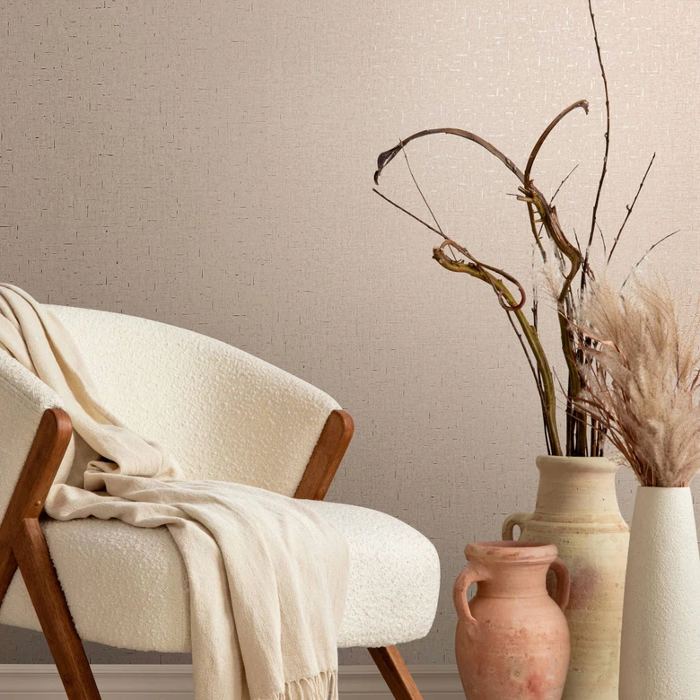 Non-woven wallpaper in a slightly shiny texture, beige plain 