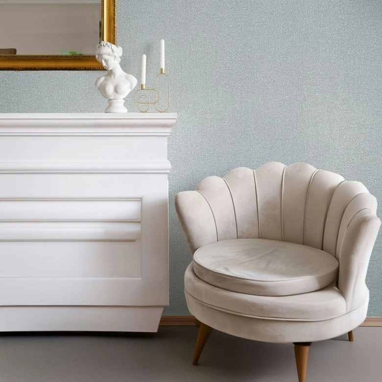 Non-woven tapet i blå texturerad textil gips ser vanligt ut 