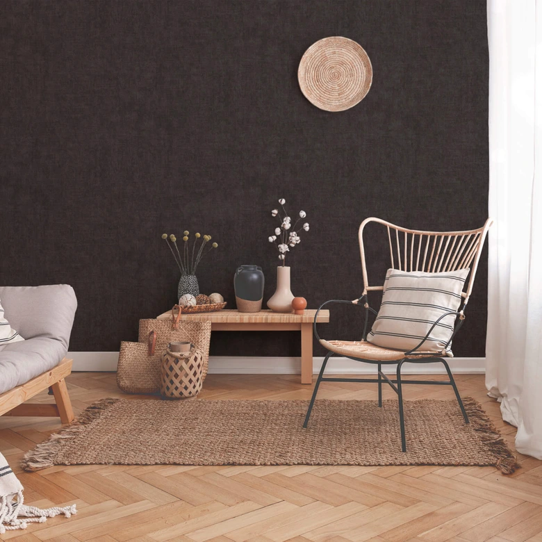 Svart enfärgad non-woven tapet New Walls Cosy & Relax från Livingwalls 