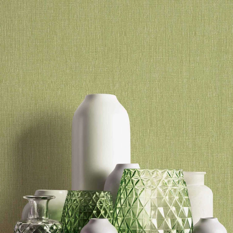 Livlig non-woven tapet i gräsgrönt med en subtil struktur - Uppfriskande väggdesign 