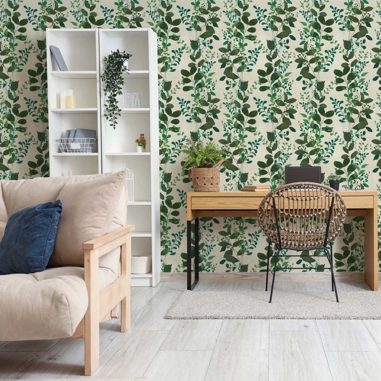 Non-woven wallpaper with a green leaf pattern on a white background 