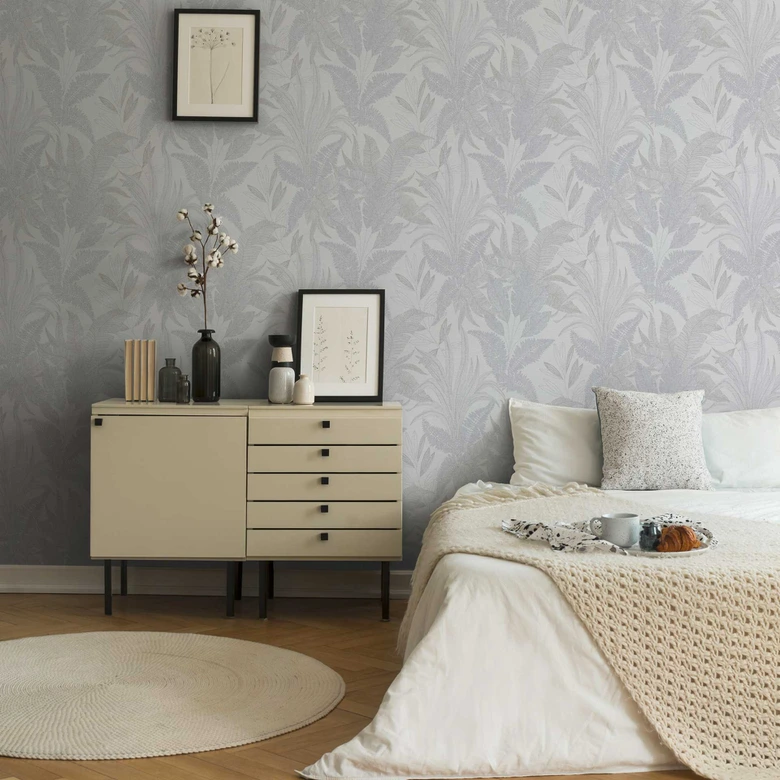 Papier peint avec un délicat motif de feuilles en gris et blanc - papier peint d'inspiration naturelle 